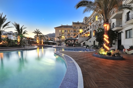 Indoor pool, 2 outdoor pools, pool umbrellas, sun loungers