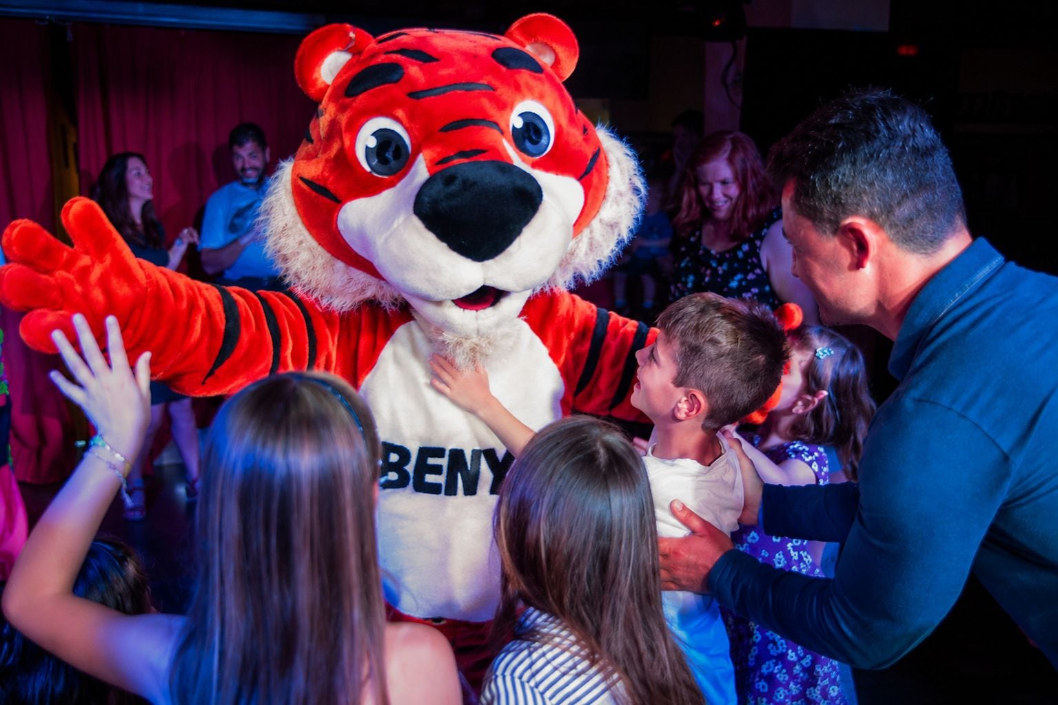 A mascot interacting with guests.