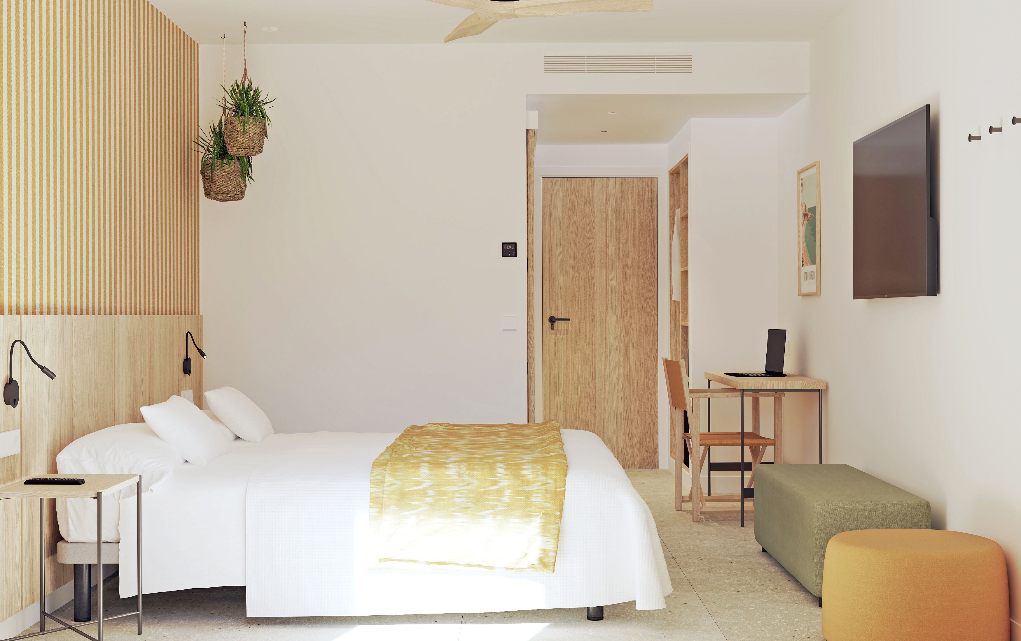 A modern bedroom with a bed, bedside table, desk, chair, and a small table with a laptop.
