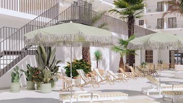 Udendørs pool, parasoller, liggestole