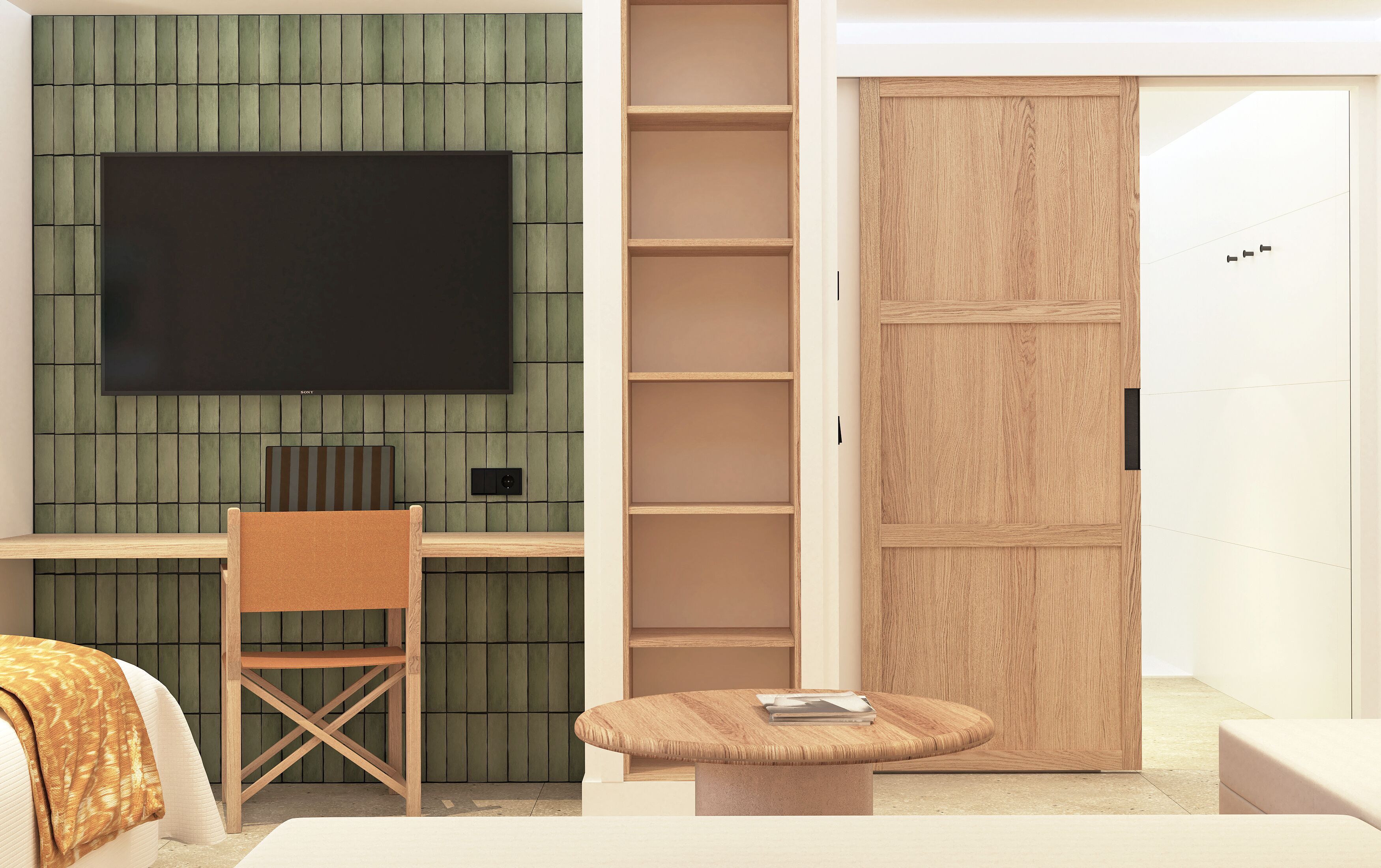 Une chambre moderne avec un téléviseur à écran plat fixé sur un mur vert, un bureau en bois avec une chaise, une petite table ronde avec un magazine et une armoire en bois dotée de plusieurs étagères.