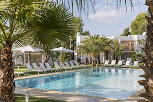 Seasonal outdoor pool, open 10:30 AM to 6:30 PM, pool umbrellas