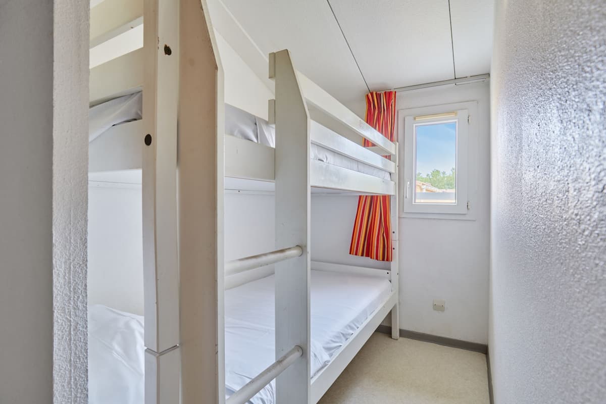 Iron/ironing board (on request), cribs (surcharge), bed sheets