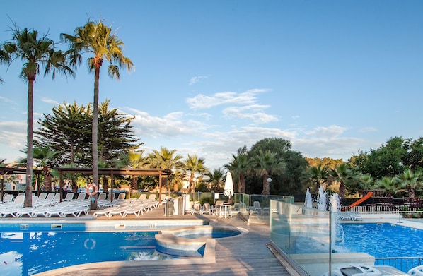 Outdoor pool, pool umbrellas, pool loungers