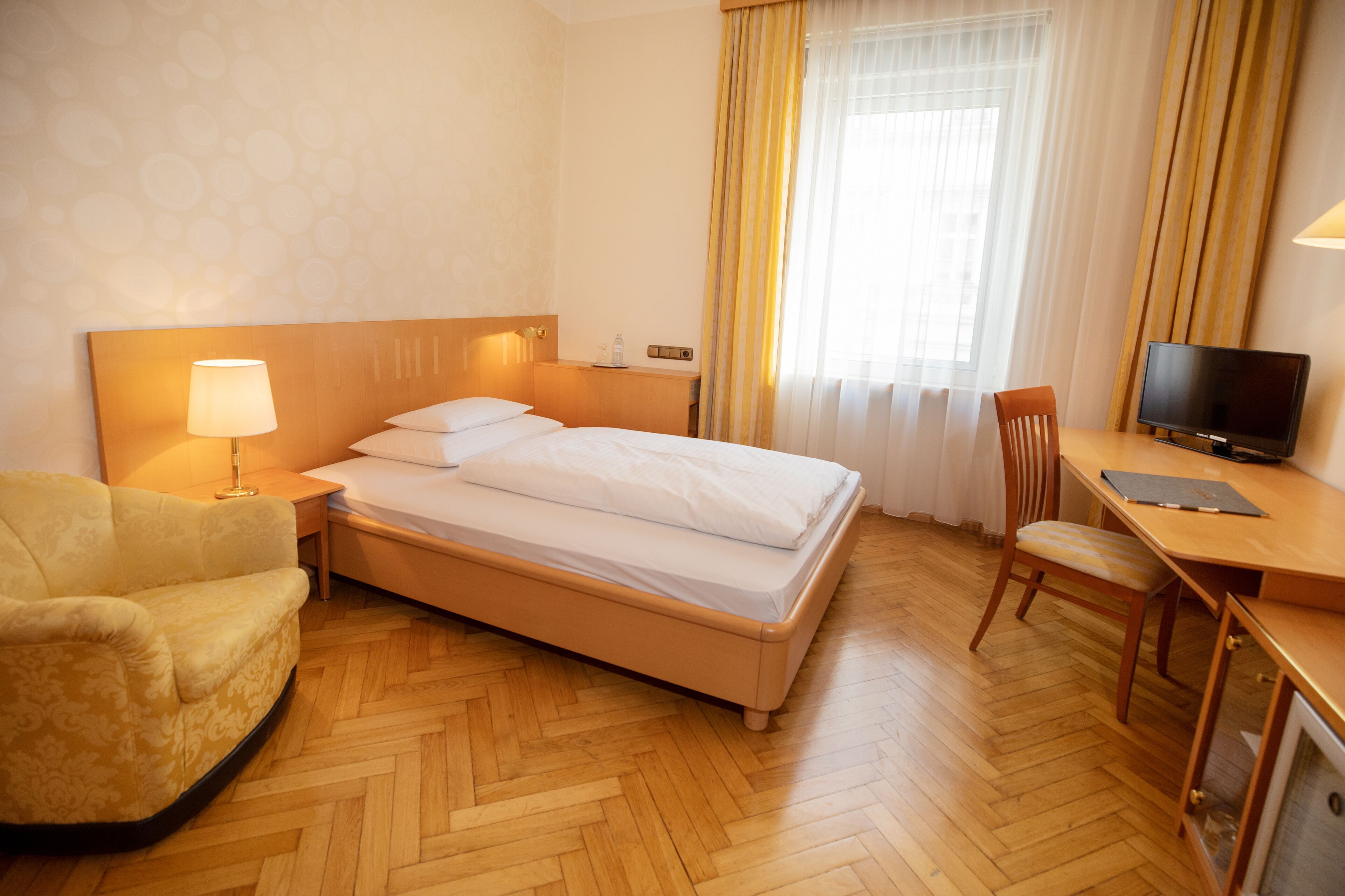 Habitación individual clásica, 1 cama individual | Ropa de cama de alta calidad y caja de seguridad en la habitación 