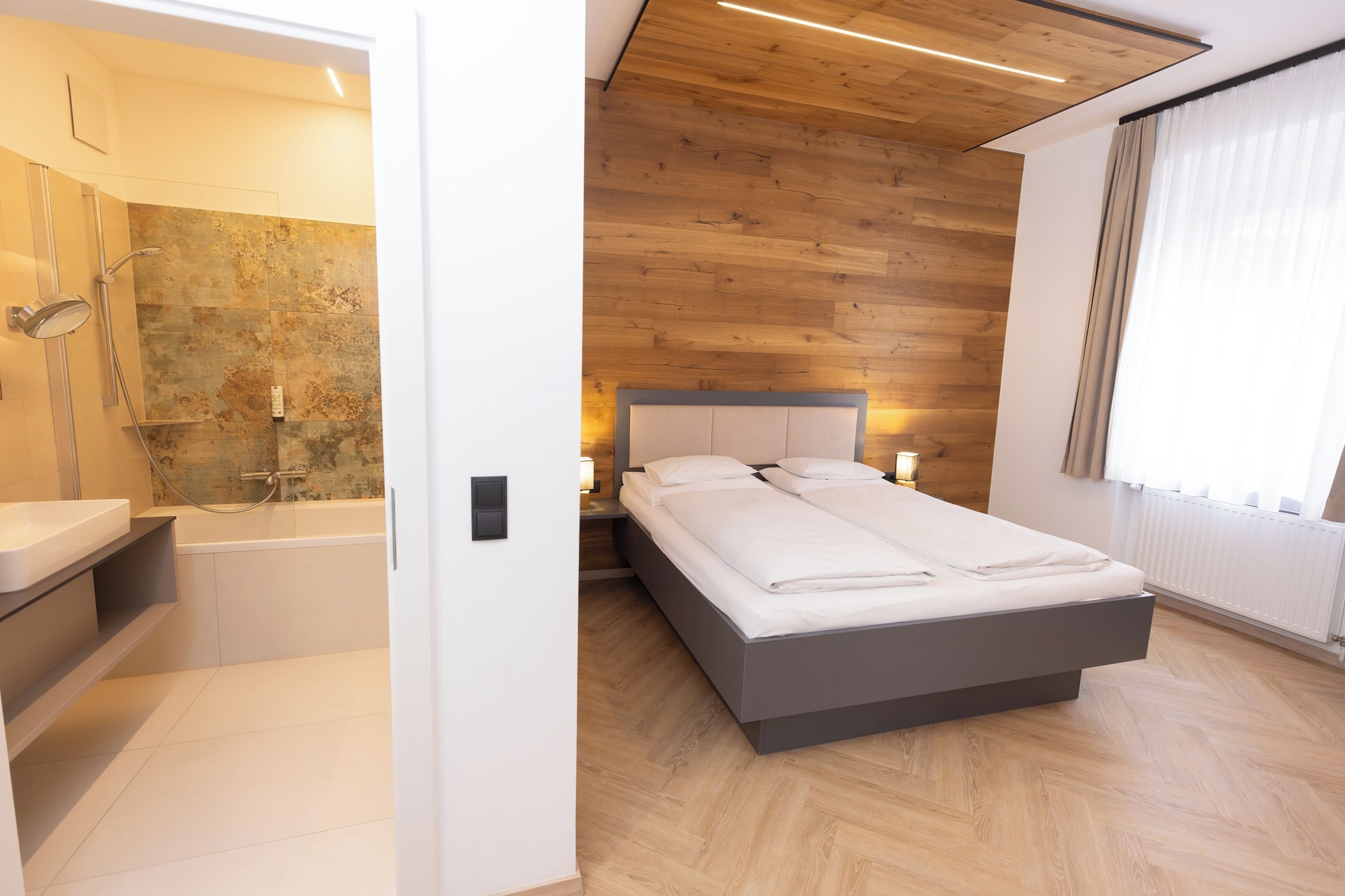 Literie de qualité supérieure, coffres-forts dans les chambres