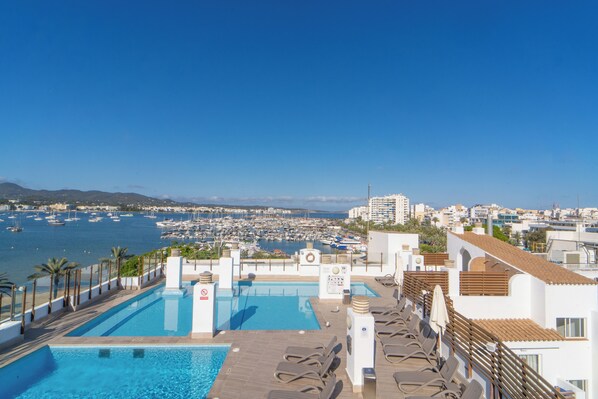 Outdoor pool, pool umbrellas, pool loungers