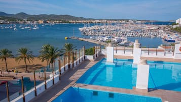 Outdoor pool, pool umbrellas, pool loungers