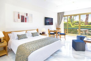 Garden Junior Suite | 1 bedroom, in-room safe, blackout drapes, iron/ironing board