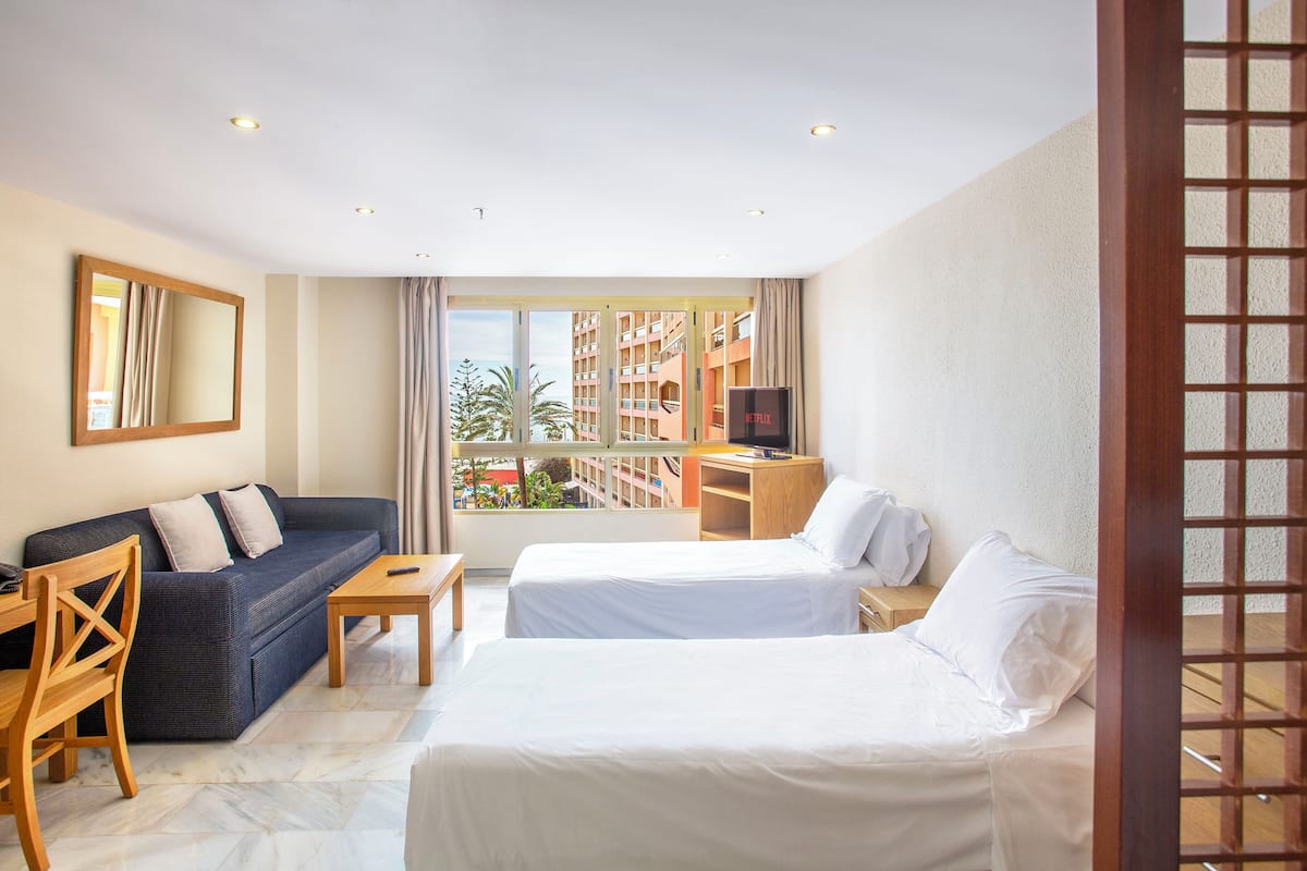 Studio without balcony (Partial sea view) | 1 bedroom, in-room safe, blackout drapes, iron/ironing board