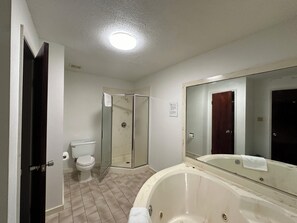 Royal Suite, 1 King Bed, Jetted Tub, City View | Bathroom | Combined shower/tub, free toiletries, towels