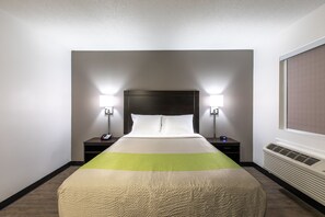 Premium bedding, pillow-top beds, desk, laptop workspace