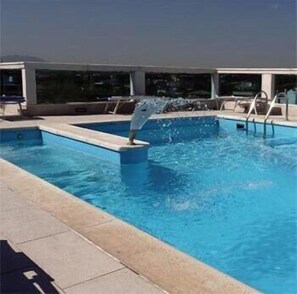 Seasonal outdoor pool, a rooftop pool, pool loungers