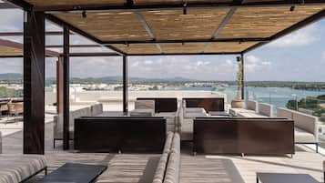 Seasonal outdoor pool, pool umbrellas, pool loungers