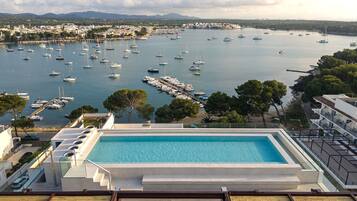 Seasonal outdoor pool, pool umbrellas, pool loungers