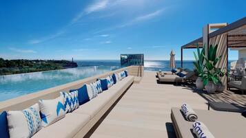 Seasonal outdoor pool, pool umbrellas, sun loungers