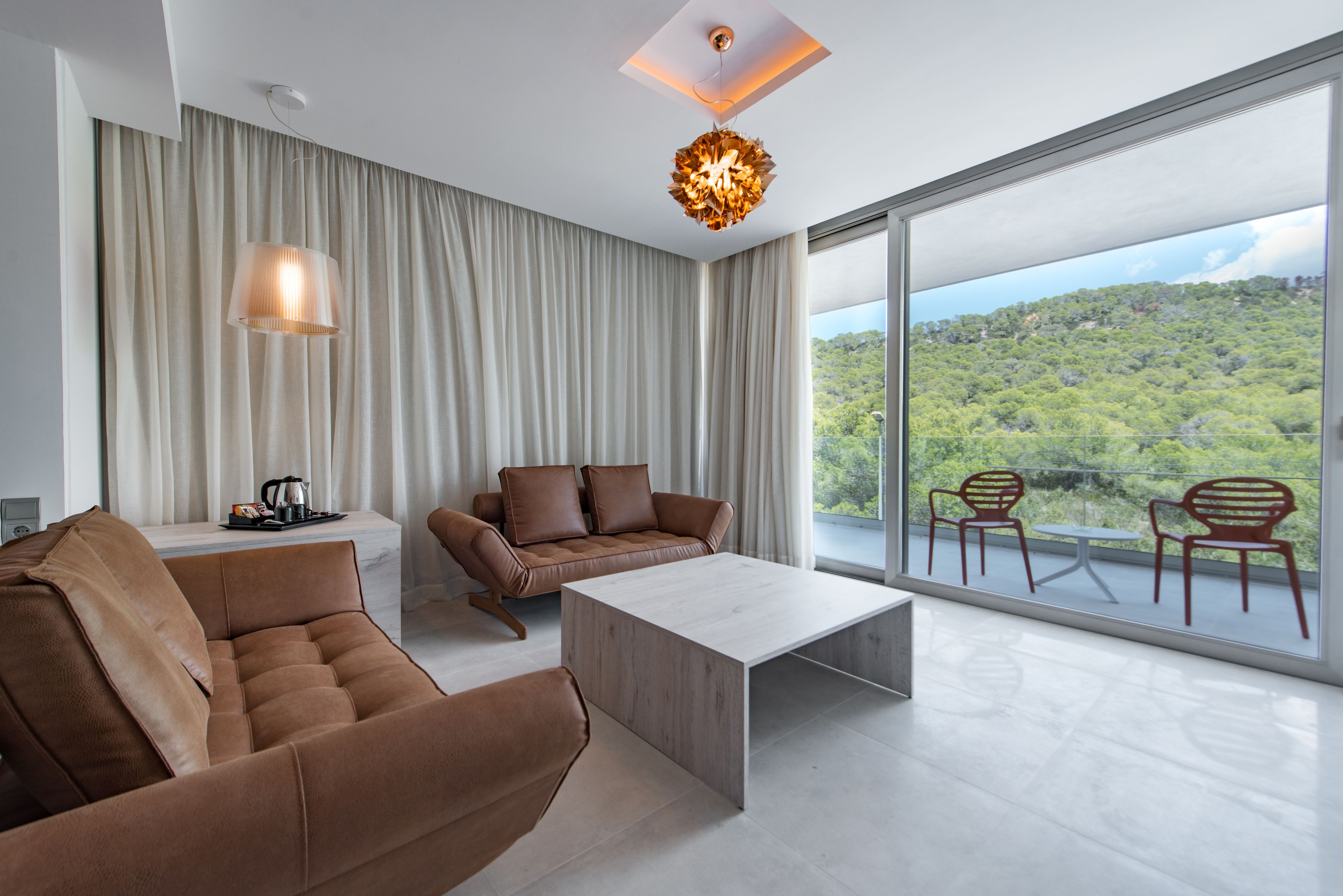 junior suite, hot tub | in-room safe, desk, blackout curtains, free wifi