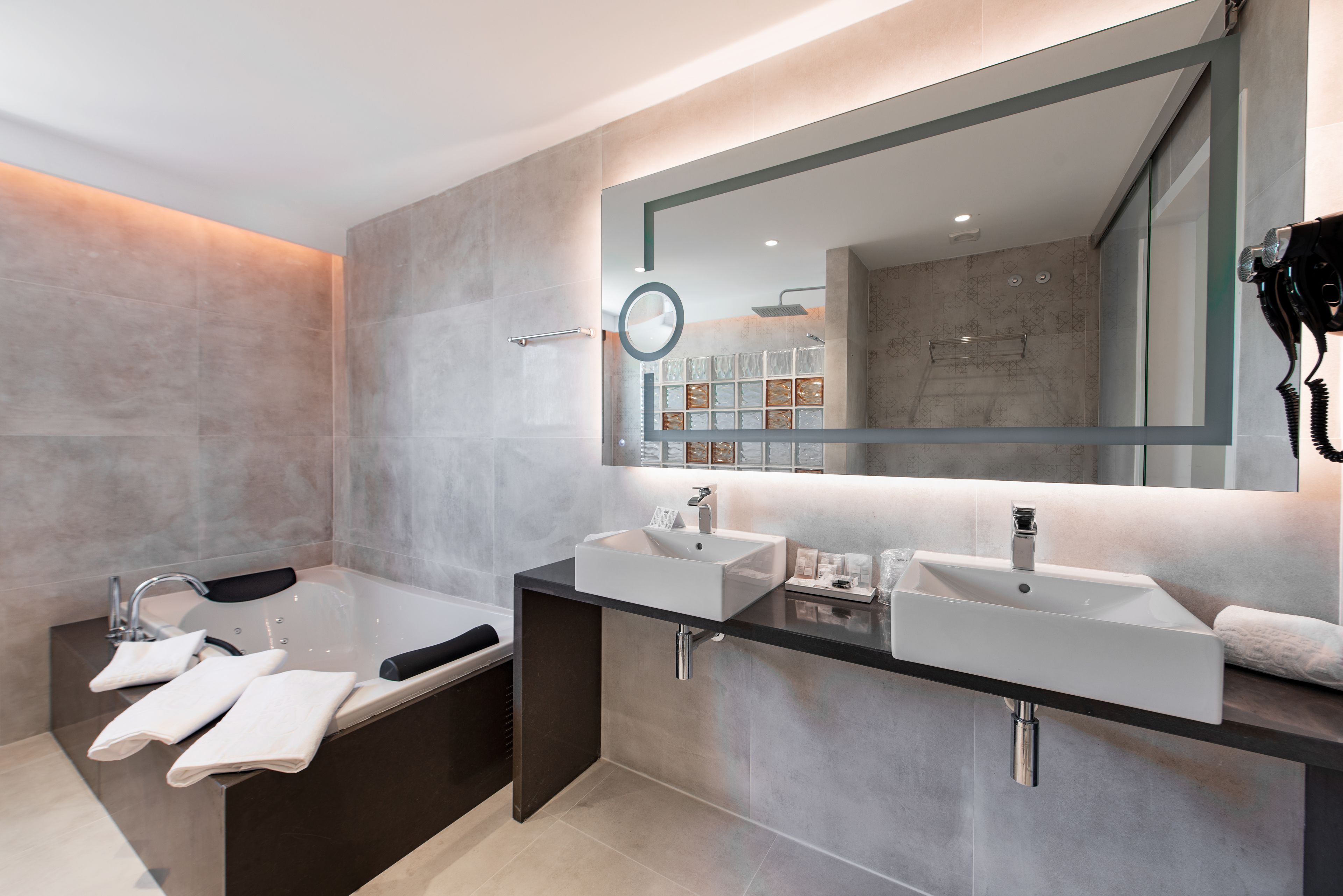 junior suite, hot tub | bathroom | hair dryer, towels