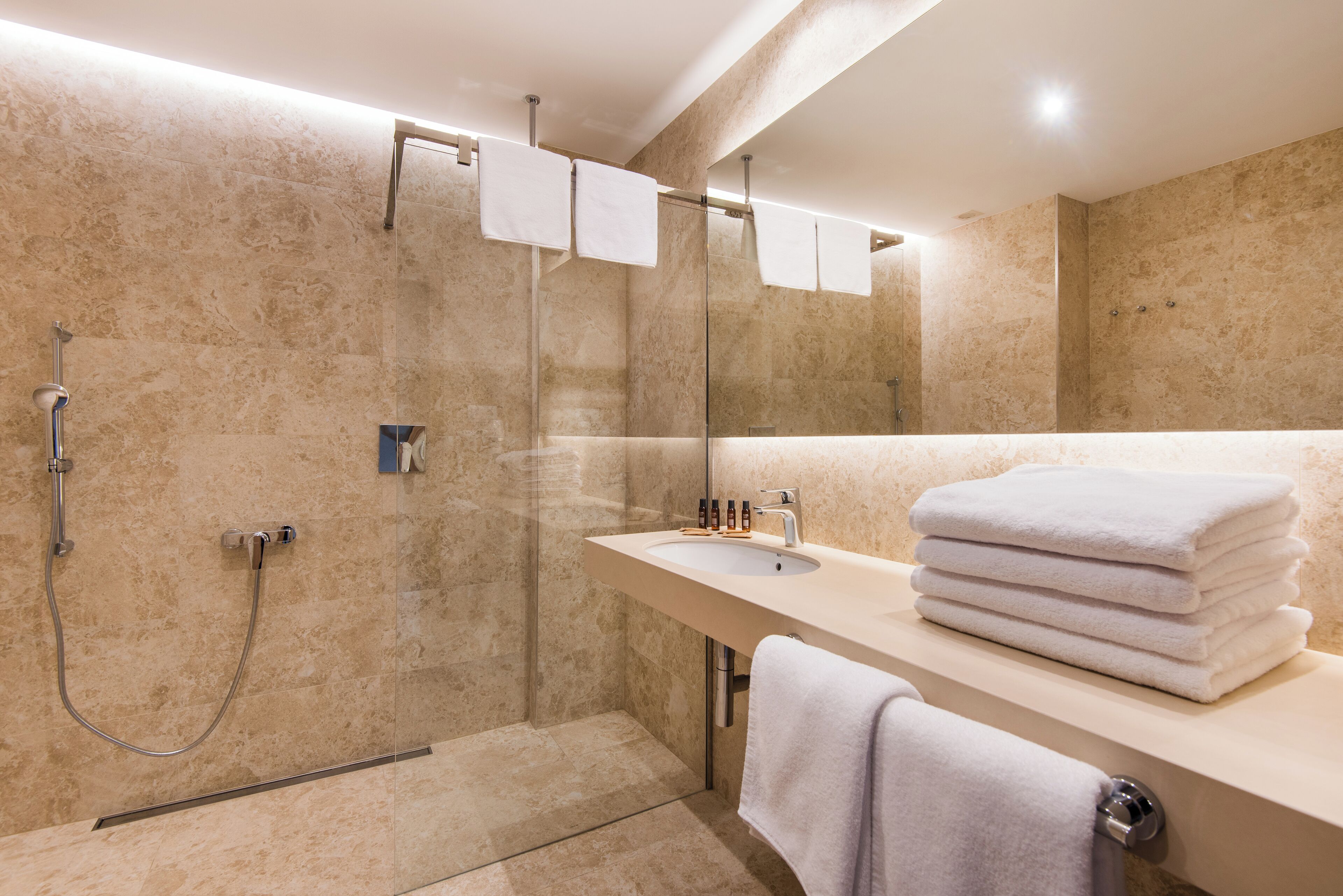 quadruple room, terrace | bathroom | shower, rainfall showerhead, hair dryer, towels