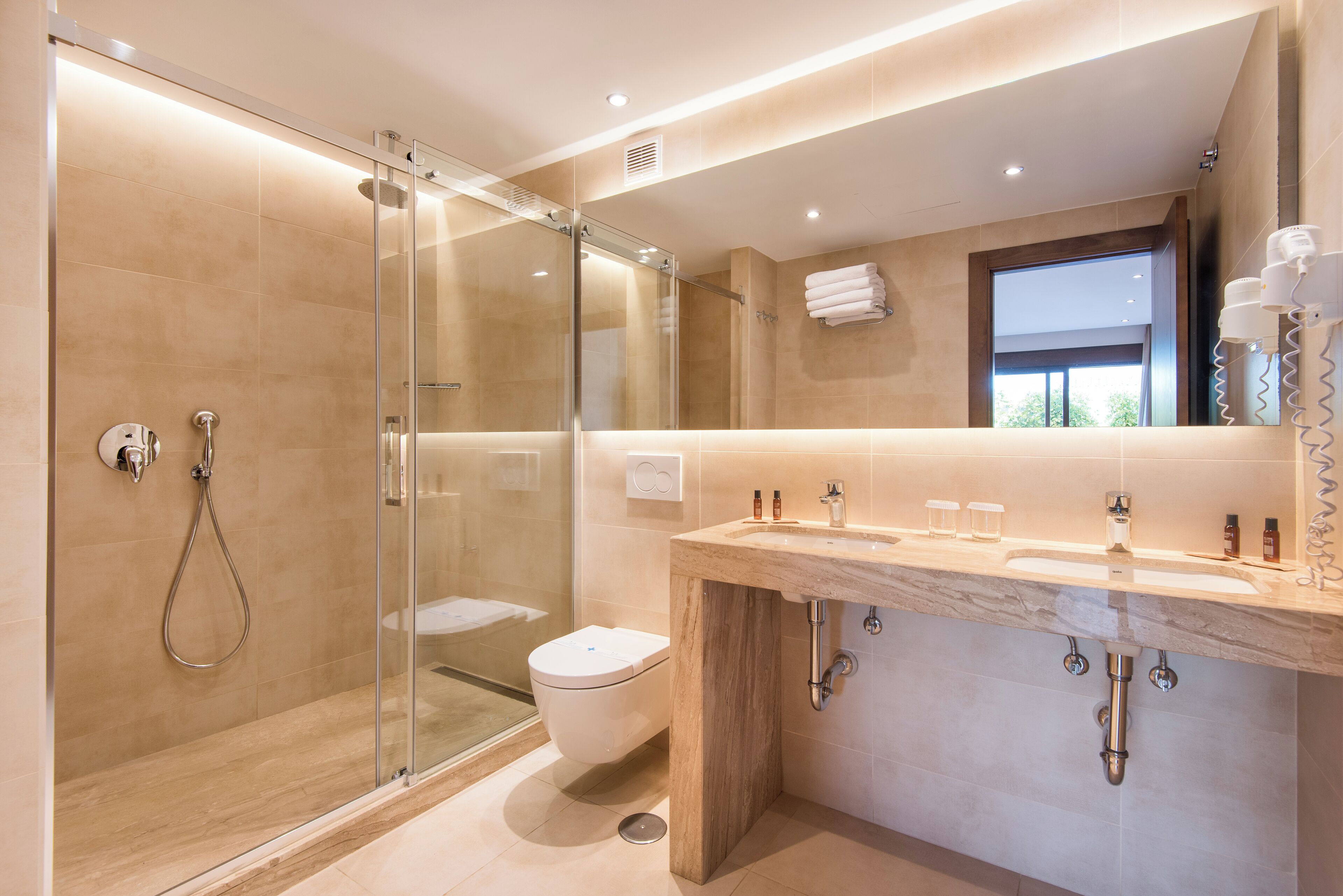 quadruple room, patio, ground floor | bathroom | shower, rainfall showerhead, hair dryer, towels