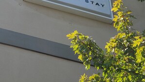 A sign for Birch Hill Suites Extended Stay.