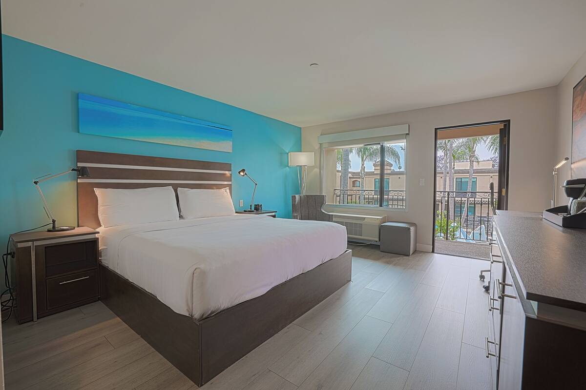 King Room with Patio | Egyptian cotton sheets, premium bedding, pillowtop beds, in-room safe