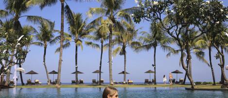 2 outdoor pools, open 8:00 AM to 6:00 PM, pool umbrellas, sun loungers