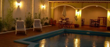 Outdoor pool, pool umbrellas, pool loungers