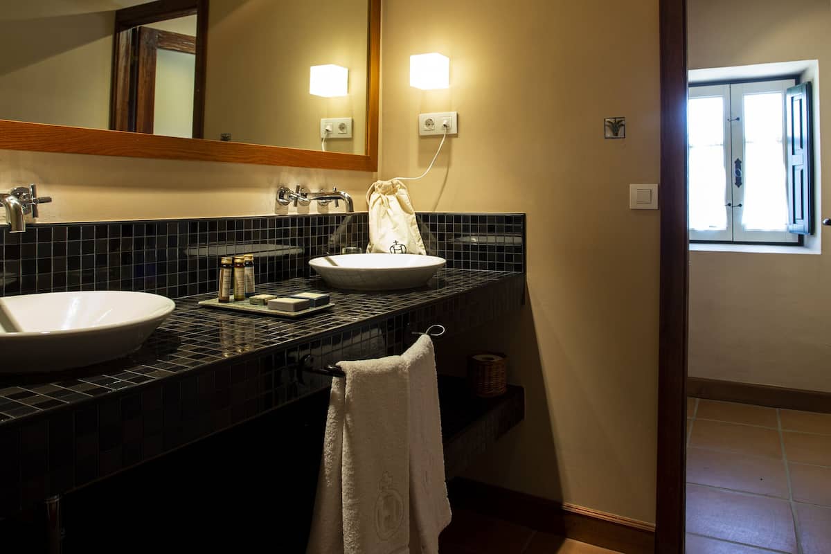 deluxe villa | bathroom | hair dryer, towels