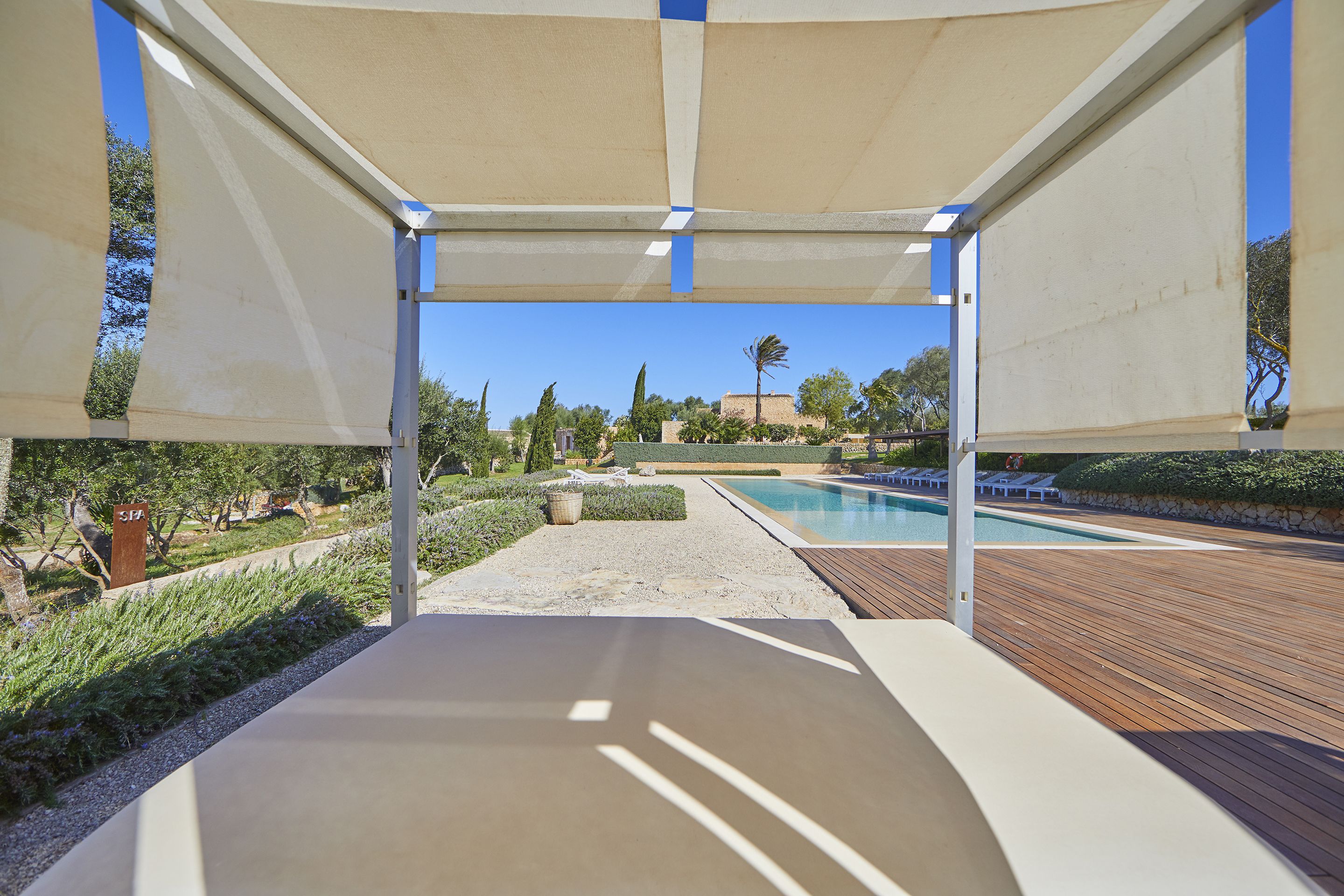 Indoor pool, outdoor pool, pool umbrellas, pool loungers