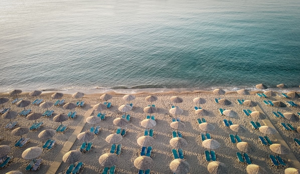 Sun loungers, beach umbrellas, beach towels, beach massages