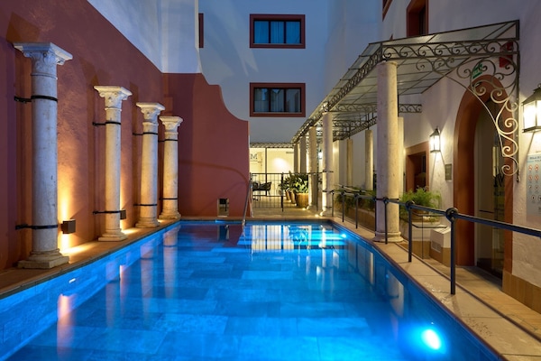 Outdoor pool, open noon to 8:00 PM, sun loungers