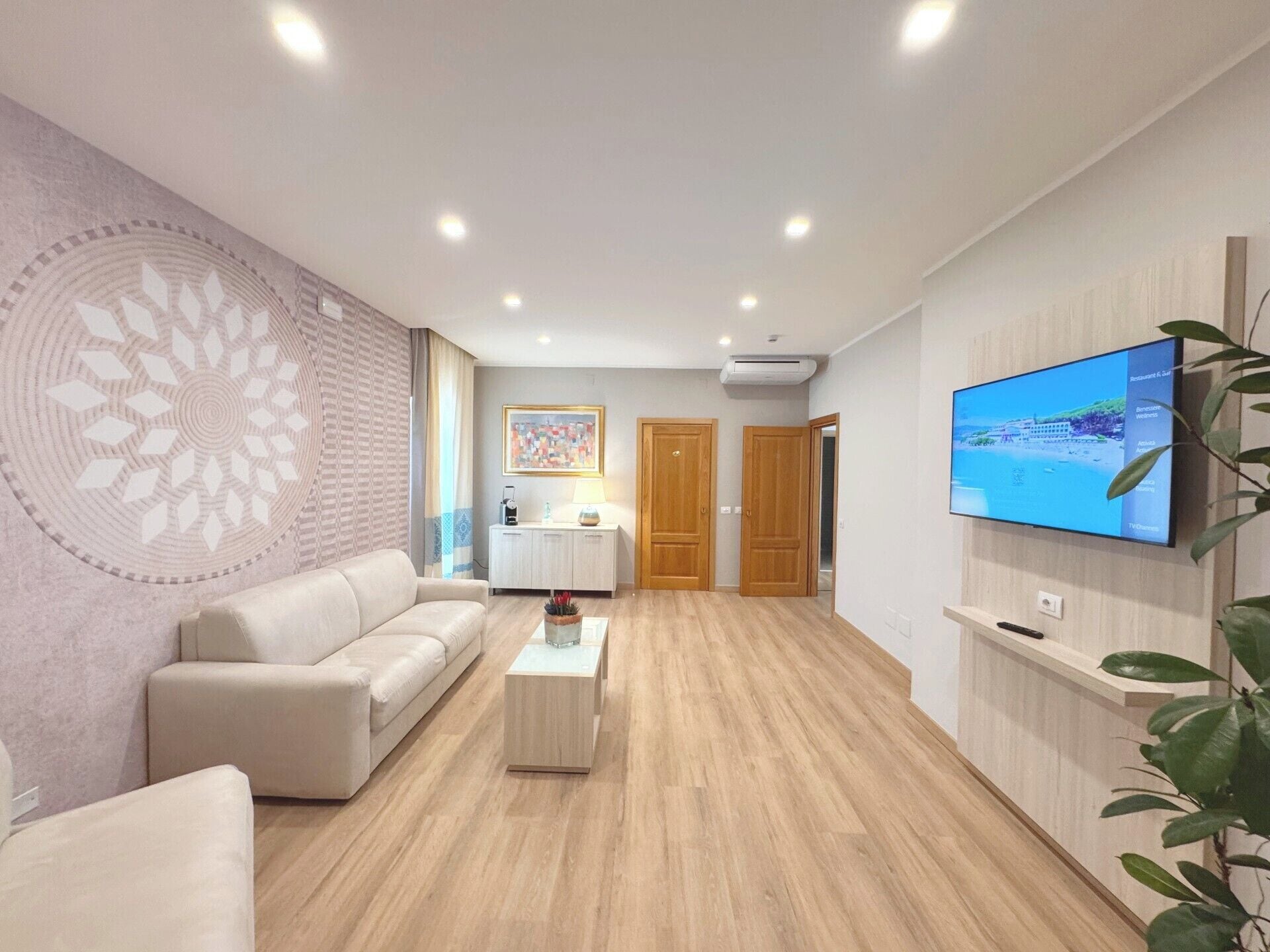 exclusive suite, 2 bedrooms, 2 bathrooms, sea view | living area | flat-screen tv