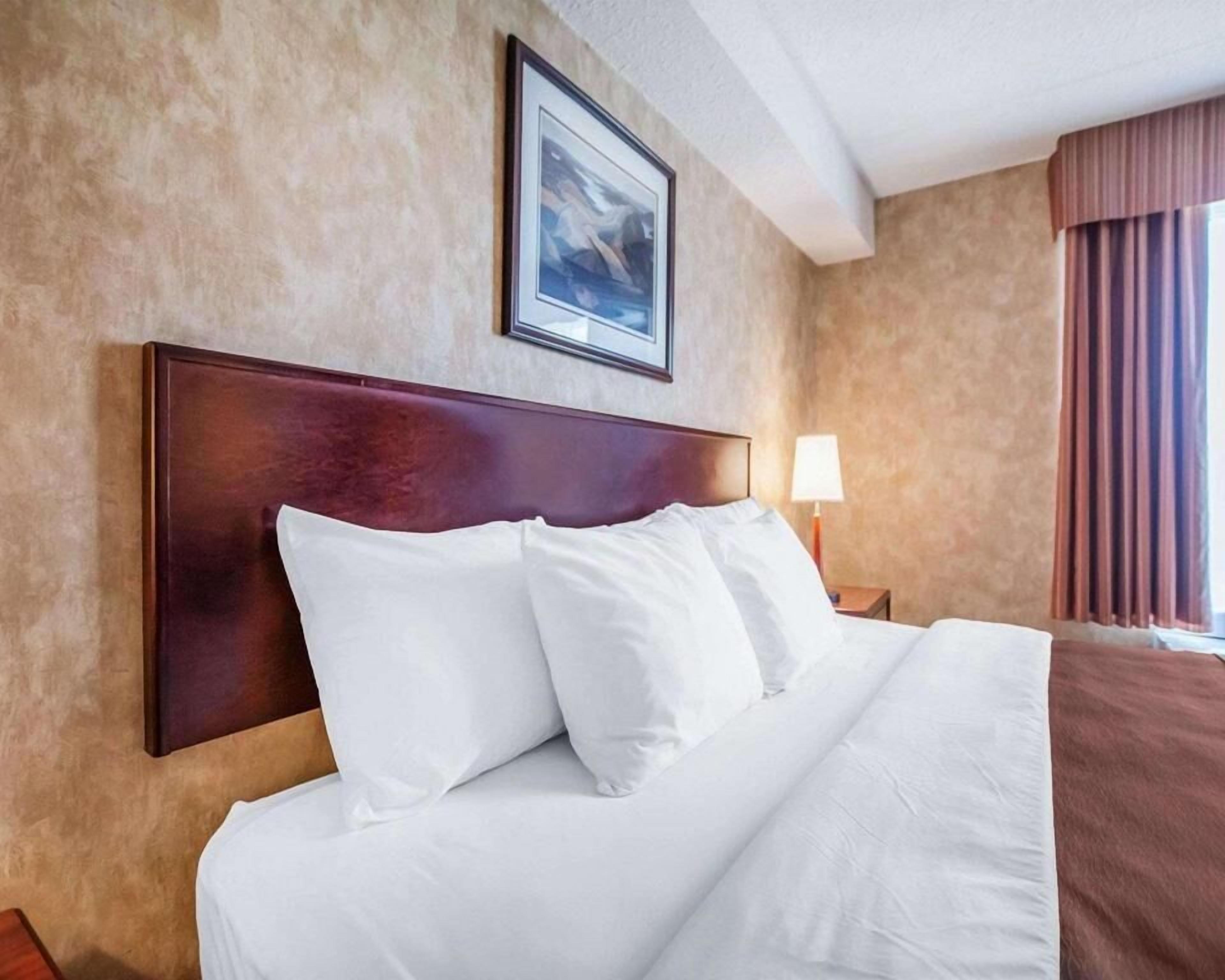 Premium bedding, pillowtop beds, desk, blackout drapes