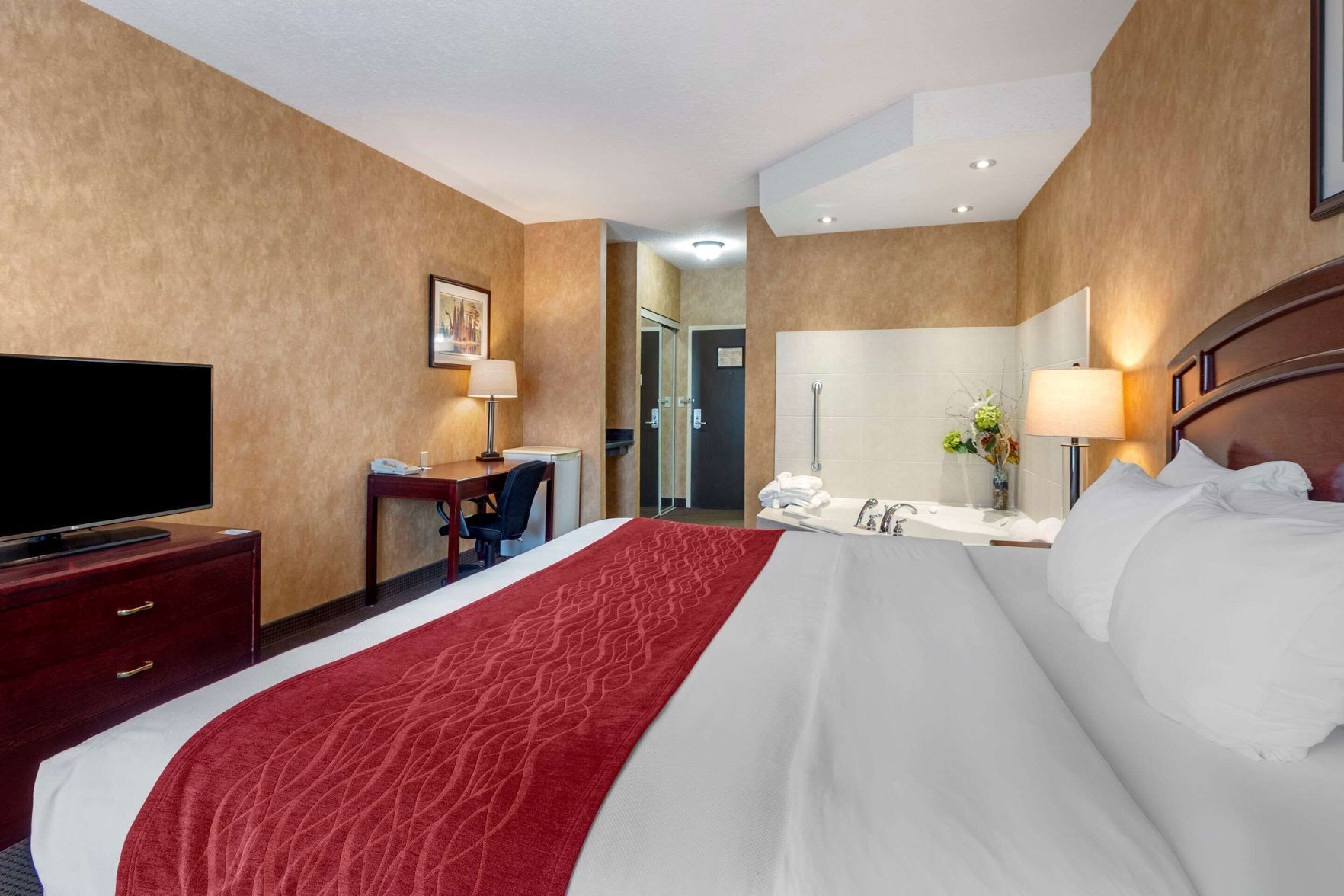 Premium bedding, pillowtop beds, desk, blackout drapes