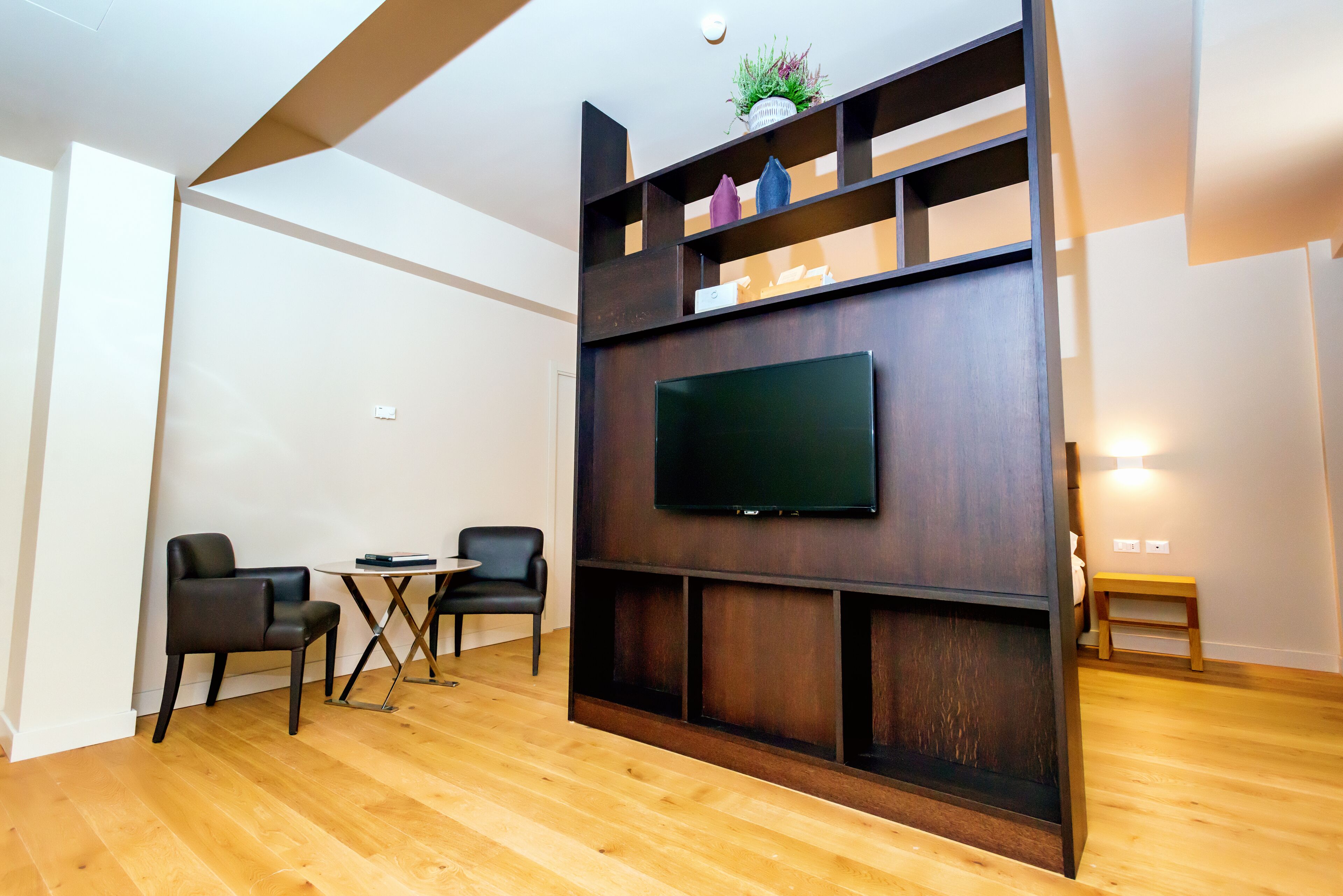 family room | 1 bedroom, minibar, in-room safe, desk