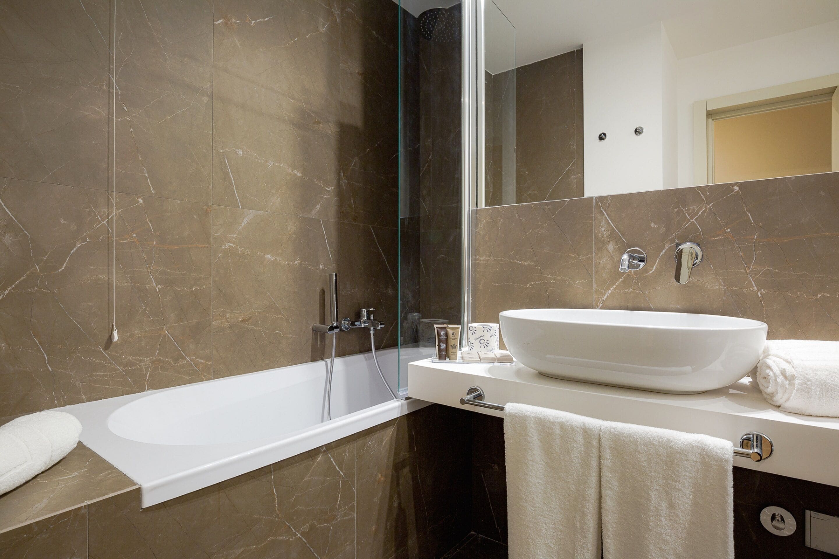 superior twin room | bathroom | combined shower/bathtub, free toiletries, hair dryer, slippers