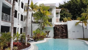 Outdoor pool, pool umbrellas, sun loungers