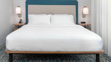 Suite estudio, 1 cama Queen size | Ropa de cama de alta calidad y caja de seguridad en la habitación