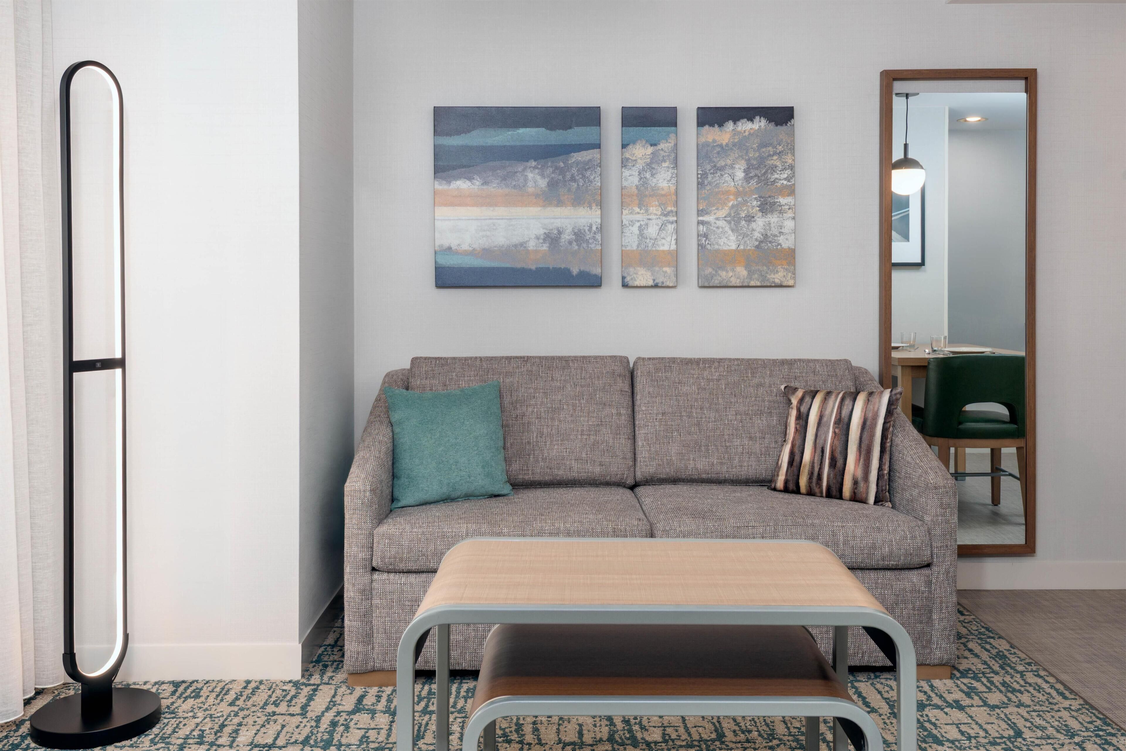 Studio Suite, 1 Queen Bed | Living area | 55-inch TV with satellite channels, DVD player
