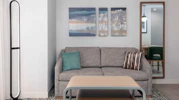 Studio Suite, 1 Queen Bed | Living area | 55-inch TV with satellite channels, DVD player