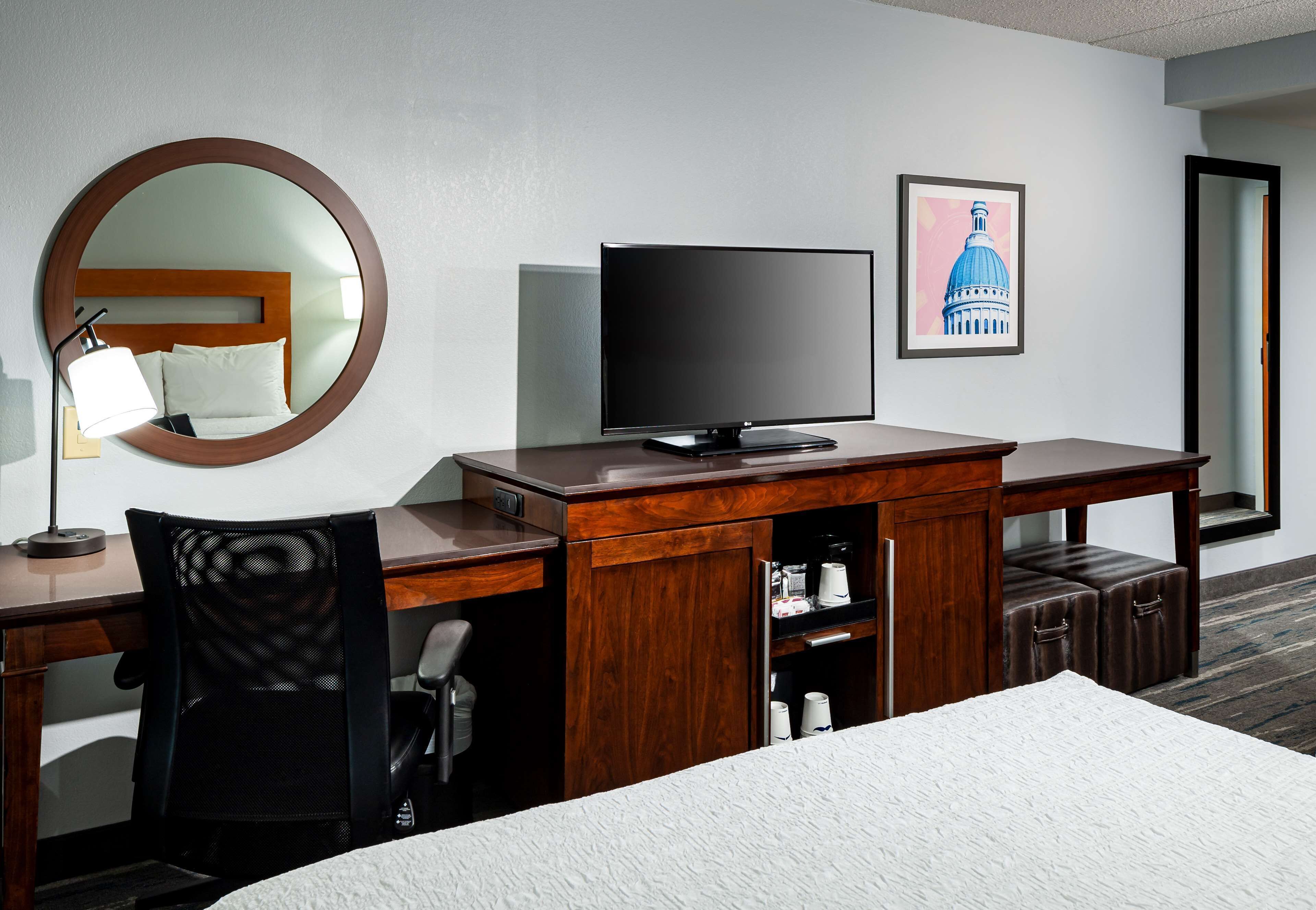 pillow-top beds, desk, laptop workspace, blackout curtains