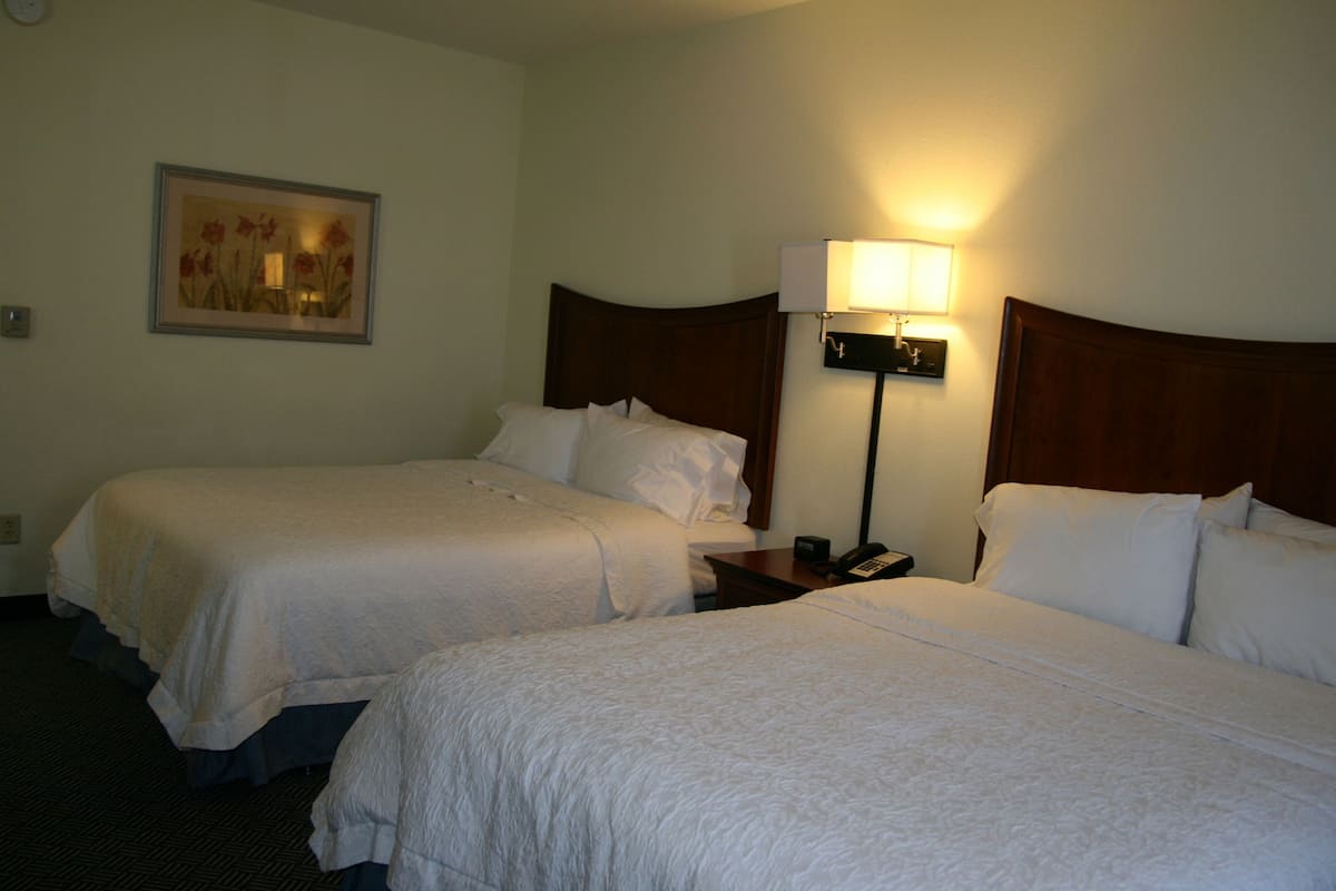 Premium bedding, pillowtop beds, desk, laptop workspace