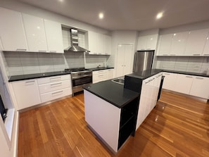 Apartment, 3 Bedrooms | Private kitchen | Fridge, microwave, coffee/tea maker, electric kettle