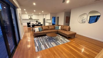 Apartment, 3 Bedrooms | Living area | 50-inch Smart TV with digital channels, TV, pay movies