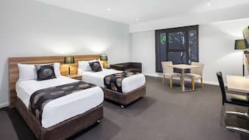 Superior Twin Room, Mobility Accessible | Minibar, in-room safe, desk, laptop workspace