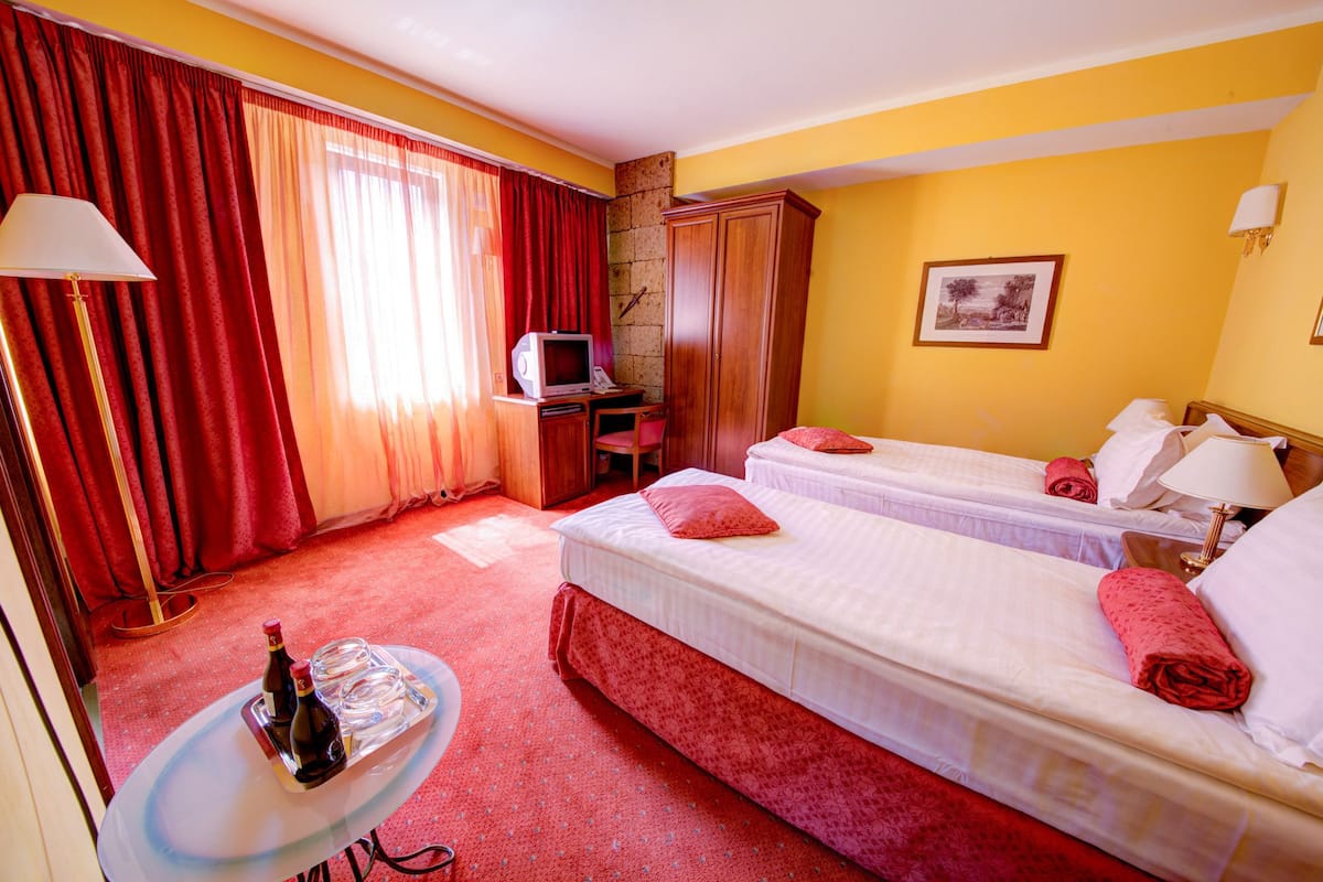 Double Room | Minibar, in-room safe, desk, rollaway beds