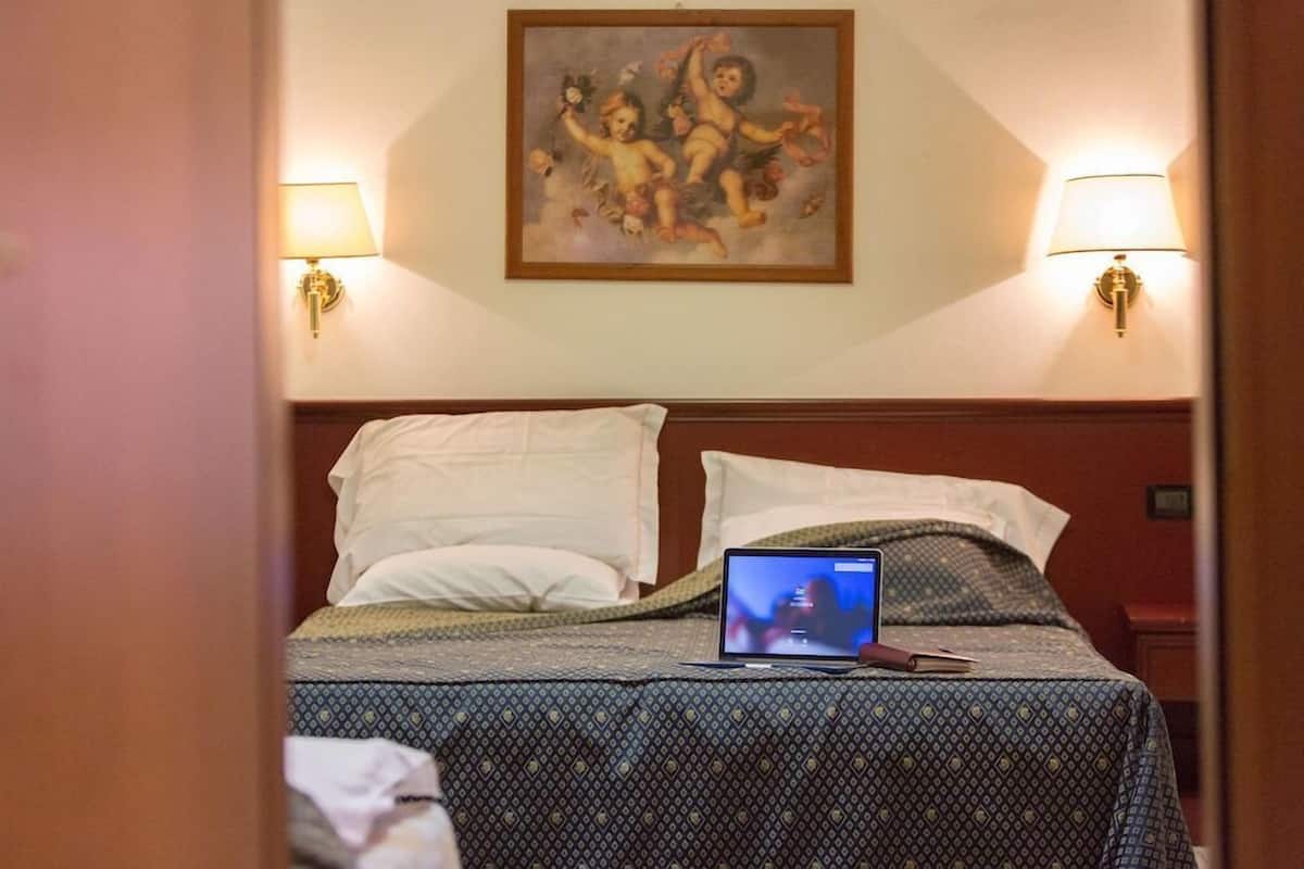 Down comforters, minibar, in-room safe, blackout drapes