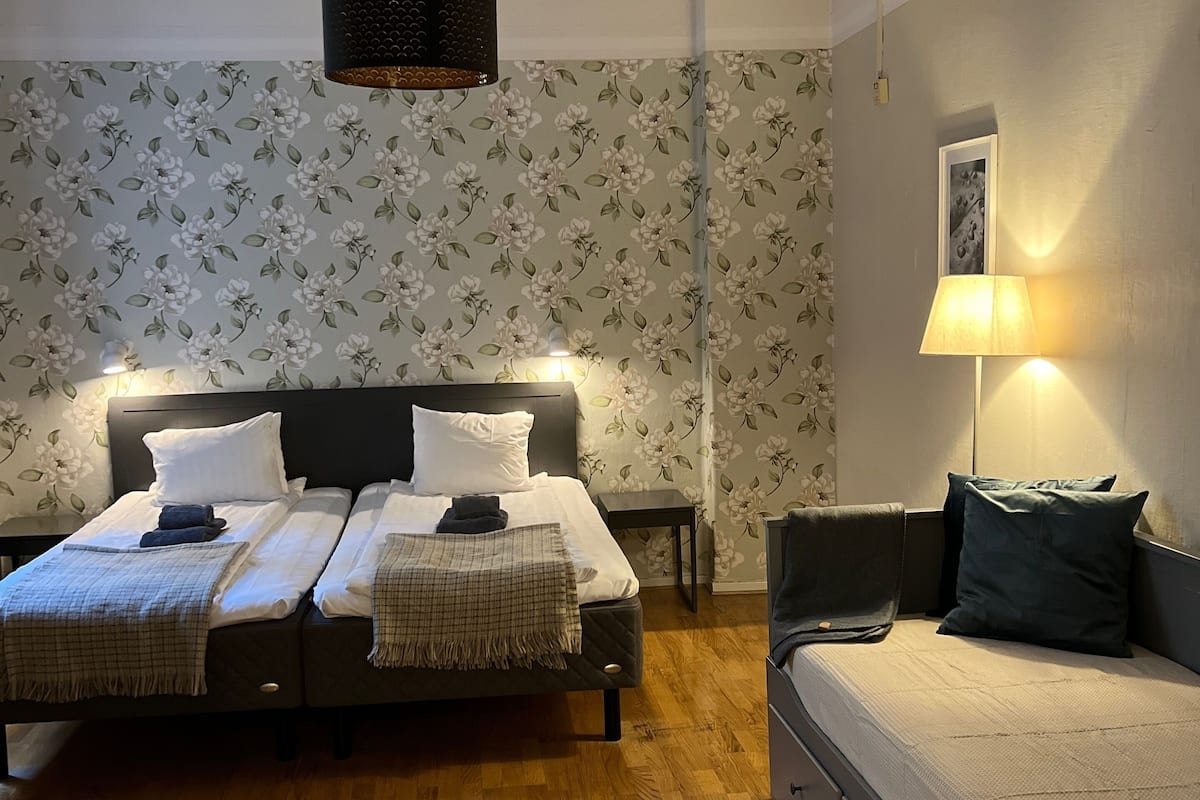 family room | 1 bedroom, premium bedding, individually furnished, desk