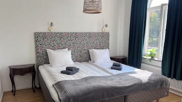 Family Room | Premium bedding, individually furnished, desk, laptop workspace